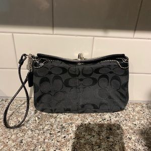 Coach signature themed wristlet